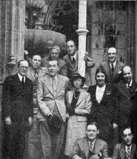 Sintra (Portugal) 1948: Seated are T. S. Eliot and our Editor. — Middle row (from the left): Robert de Traz, Jacques de Lacretelle, Mme de Lacretelle, Mme. A Ferro, António Ferro — Upper row (from the left): Máximo Buontempelli, Aldo Bizarri, Eng. J. Silva Dias.